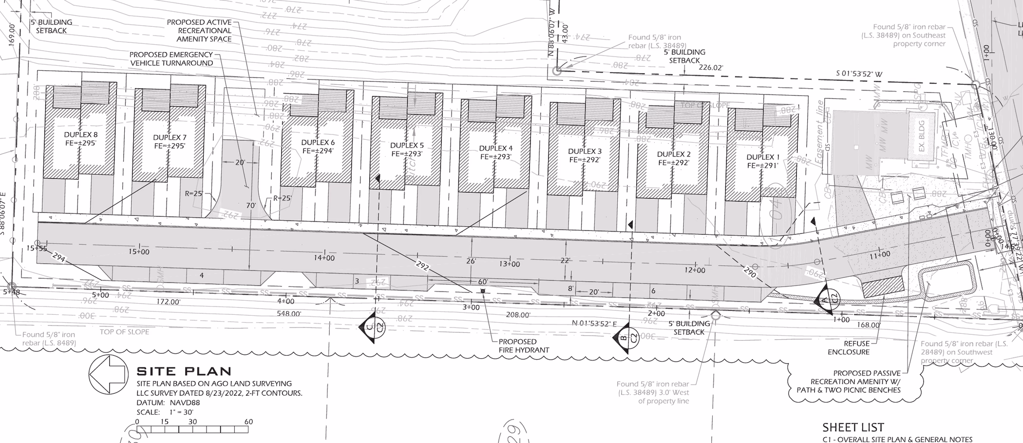 Approved site plan for Dauntless Townhomes: eight duplexes numbered 1 to 8 along a private drive off Dauntless Drive Northwest, with an emergency vehicle turnaround and recreational amenity space at the west end, a refuse enclosure and mailboxes at the east, and building setbacks marked throughout.